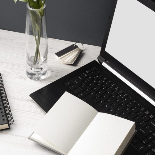 desk-assortment-with-laptop-notebooks